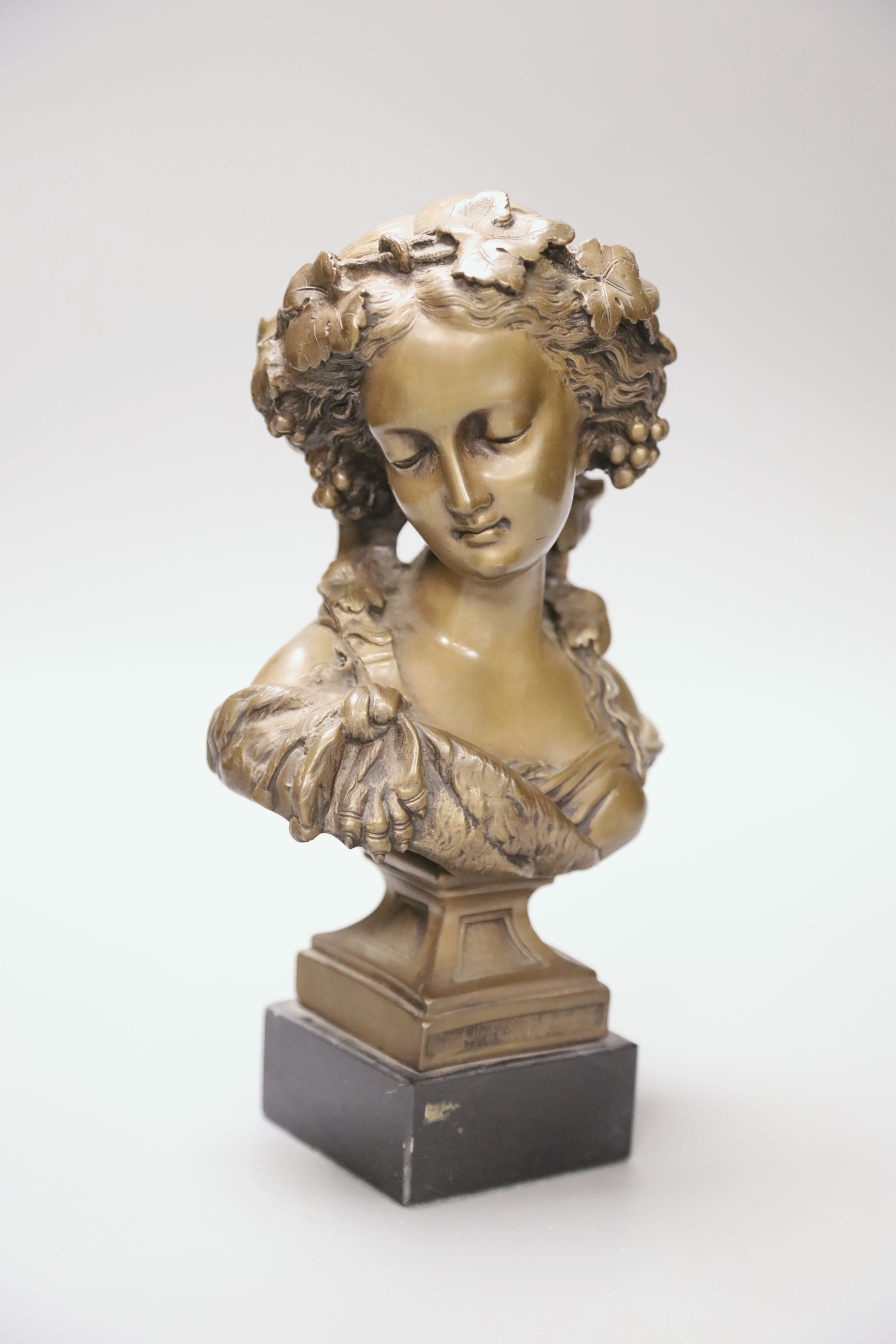 A bronzed composition bust of a lady, height 25cm